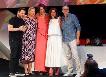 ive people accepting their Cannes Lions awards win, with Current Global CEO Virginia Devlin second from left.